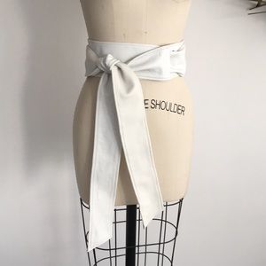 Karen Zambos white leather wrap belt